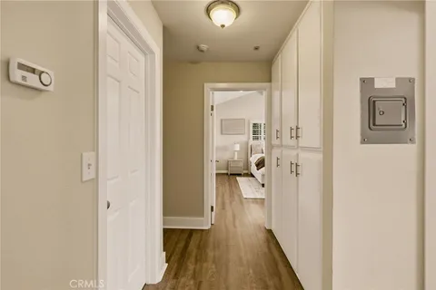 a kitchen with stainless steel appliances granite countertop wooden cabinets a sink and a large window