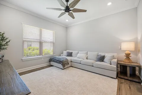 a living room with furniture and a window