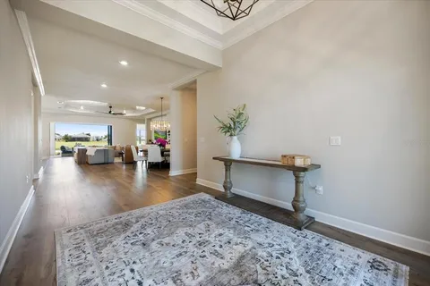 a view of an entryway and livingroom