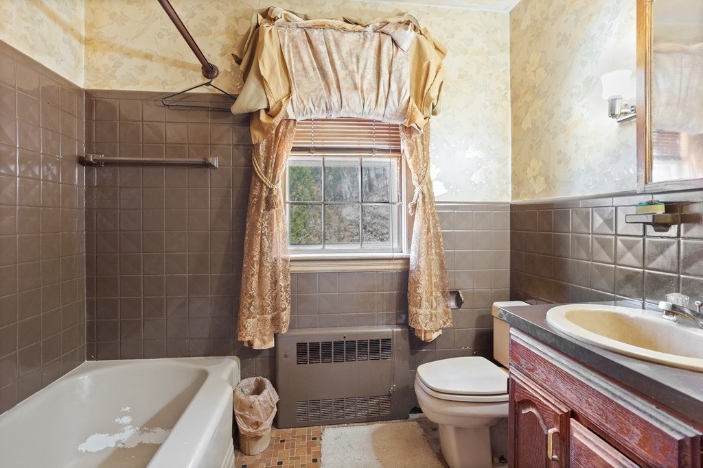 265 Varick Road Newton, MA 02468 - Photo 11 of 22 a bathroom with a sink toilet and shower