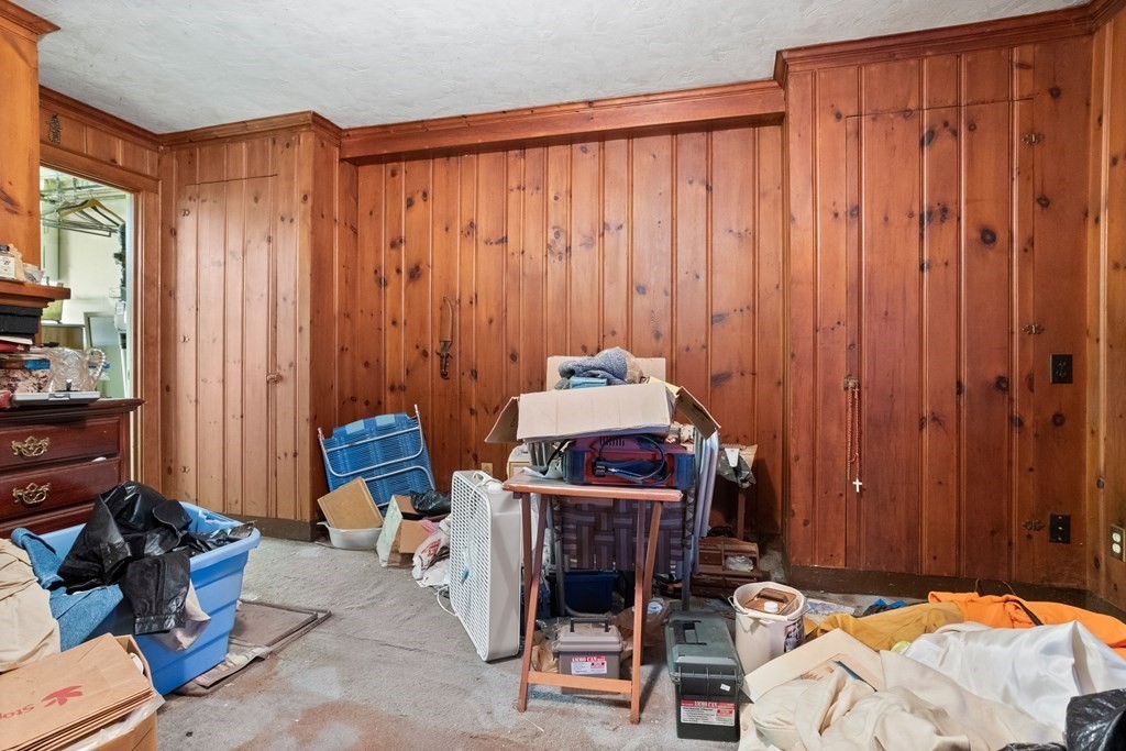 265 Varick Road Newton, MA 02468 - Photo 13 of 22 a bedroom with furniture and a closet