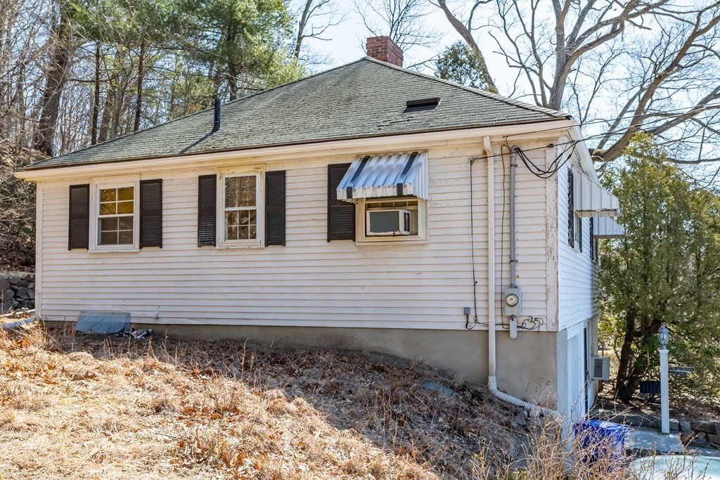 265 Varick Road Newton, MA 02468 - Photo 18 of 22 a front view of a house with garden