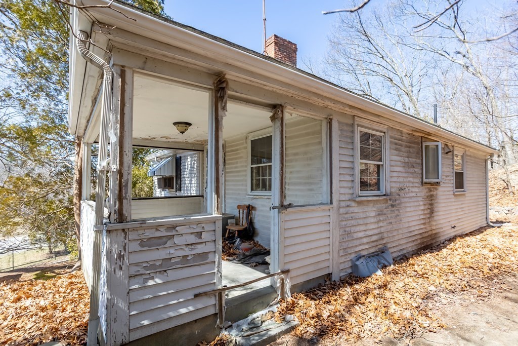 265 Varick Road Newton, MA 02468 - Photo 20 of 22 a view of a house with a yard