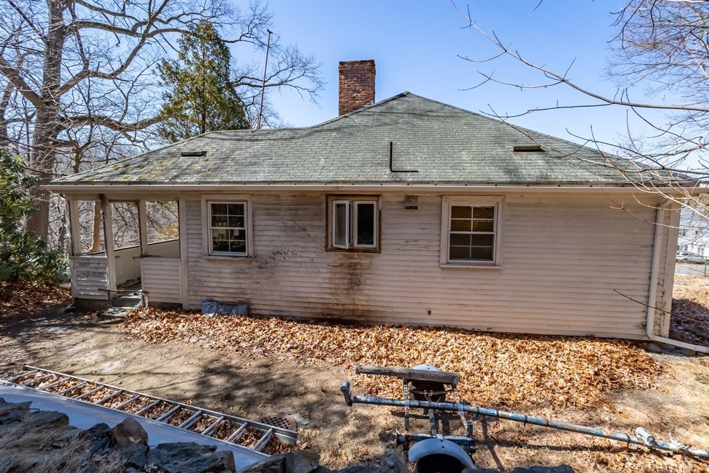 265 Varick Road Newton, MA 02468 - Photo 22 of 22 a front view of a house with a yard