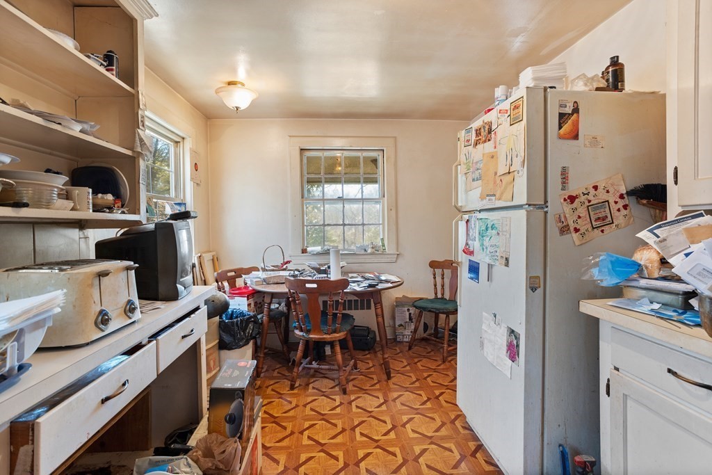 265 Varick Road Newton, MA 02468 - Photo 9 of 22 a view of a livingroom with furniture and window