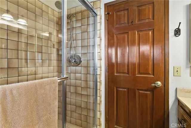a view of a patio with table and chairs and potted plants