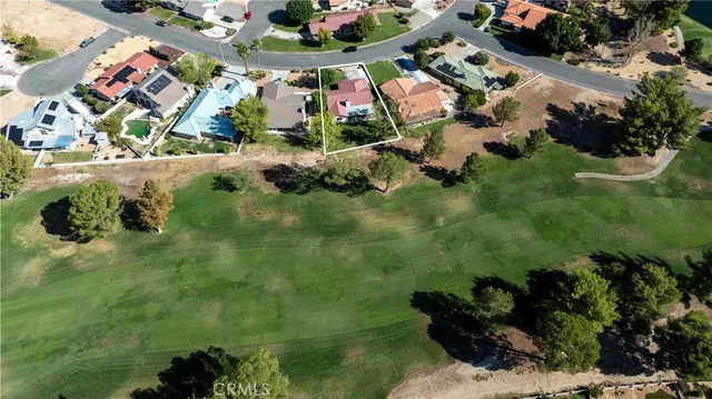 an aerial view of a city with lots of residential buildings