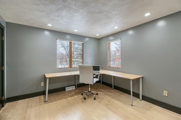 75 Mill Road Chelmsford, MA 01824 - Photo 12 of 17 a view of a workspace with furniture and a window