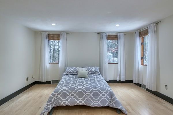75 Mill Road Chelmsford, MA 01824 - Photo 13 of 17 a bedroom with a bed and a window