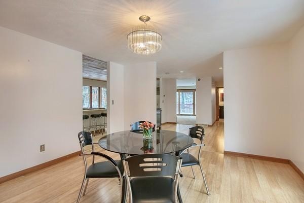 75 Mill Road Chelmsford, MA 01824 - Photo 9 of 17 a view of a dining room with furniture and wooden floor