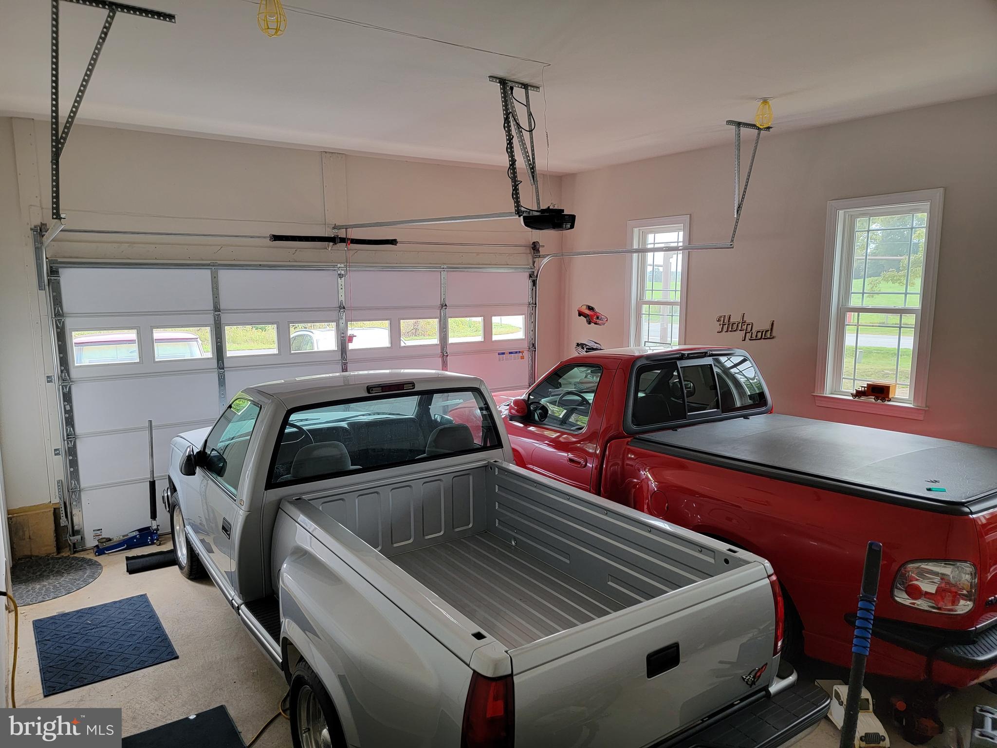7946 Rogues Road Catlett, VA 20119 - Photo 26 of 50 a kitchen with stainless steel appliances kitchen island granite countertop a sink a counter space and a window