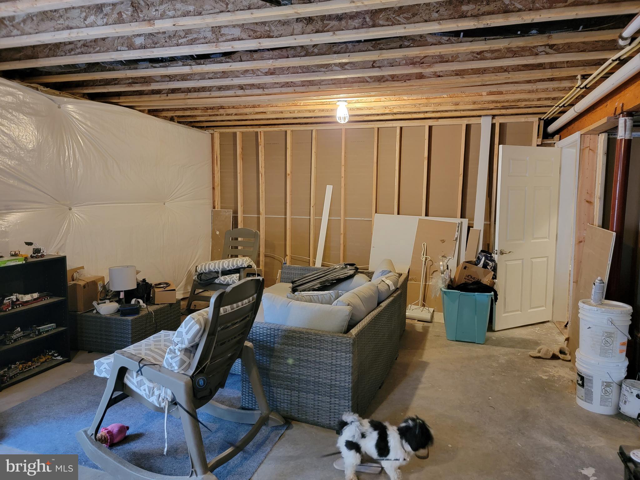 7946 Rogues Road Catlett, VA 20119 - Photo 31 of 50 a living room with furniture and a flat screen tv