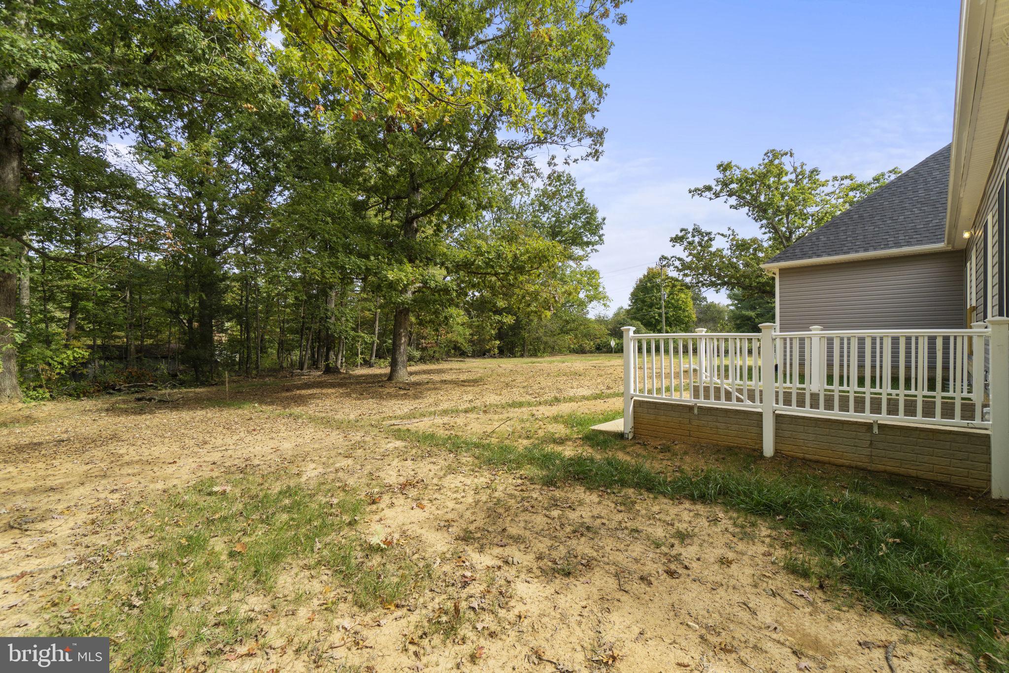 7946 Rogues Road Catlett, VA 20119 - Photo 33 of 50 a view of a yard with wooden fence