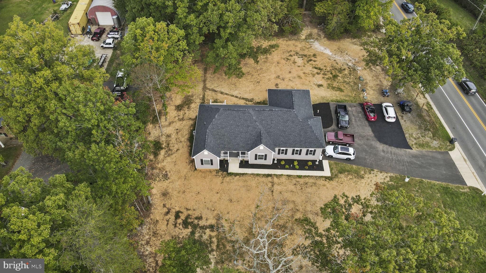 7946 Rogues Road Catlett, VA 20119 - Photo 45 of 50 a view of a house with yard and sitting area