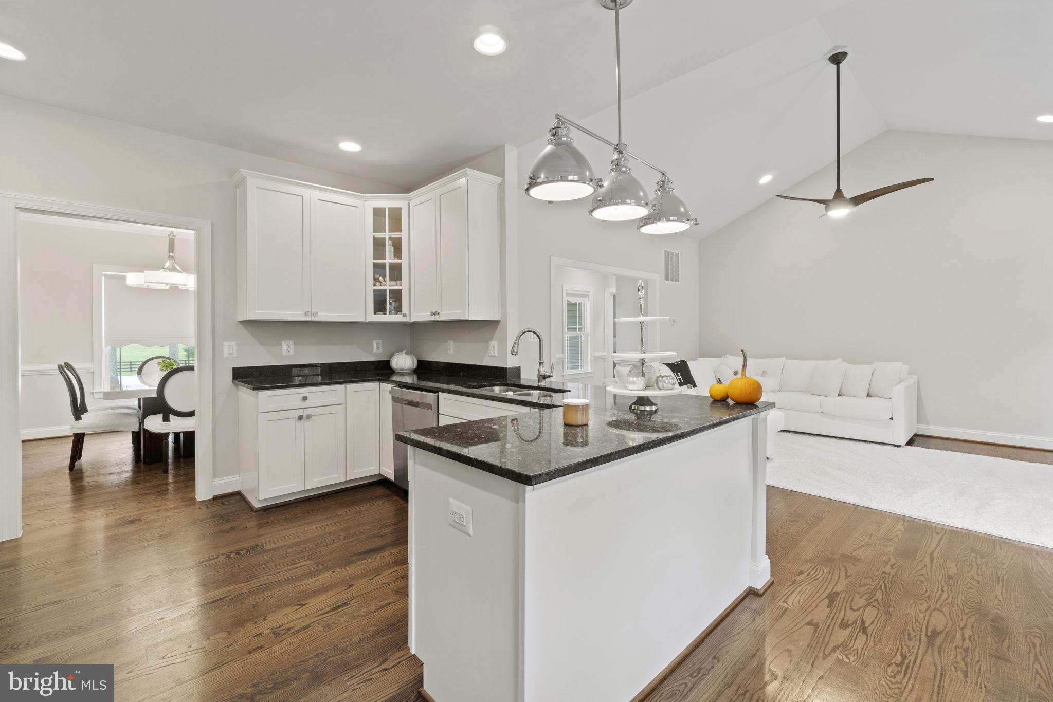 7946 Rogues Road Catlett, VA 20119 - Photo 7 of 50 a kitchen with stainless steel appliances a stove a sink and a refrigerator