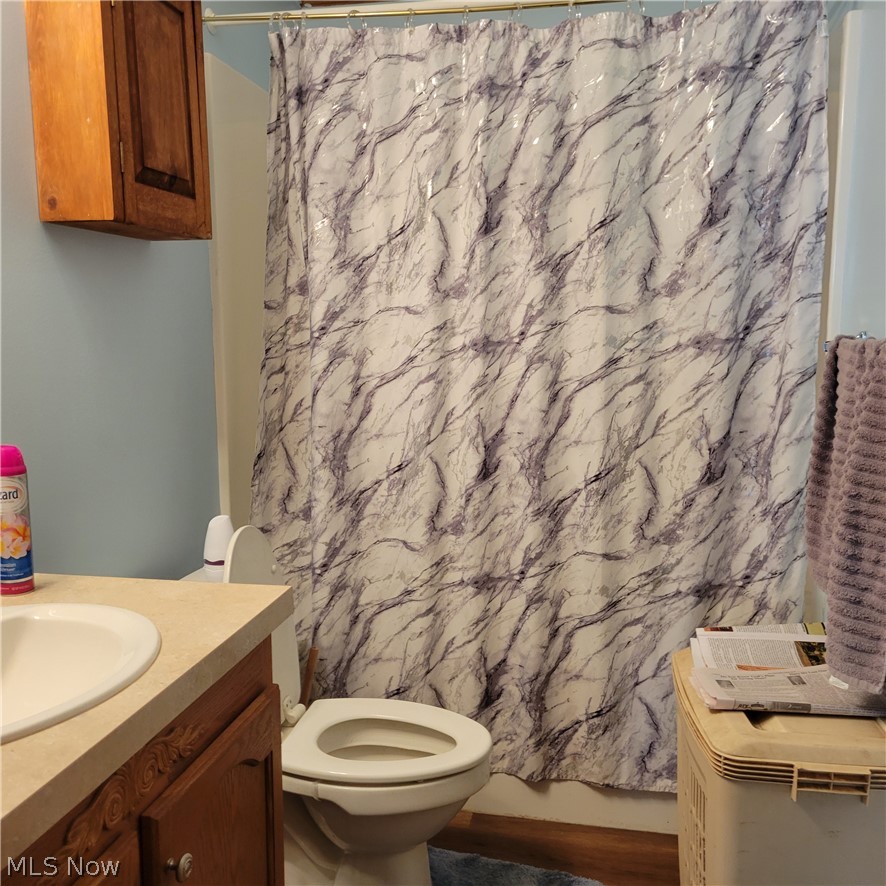 9531 McCormick Road Southwest Newcomerstown, OH 43832 - Photo 13 of 44 Bathroom with toilet and vanity