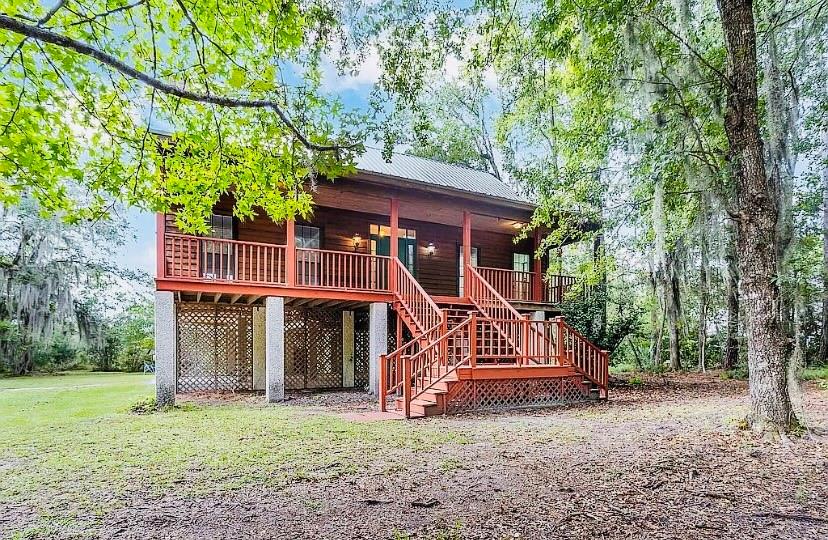 1525 Black Island Road Darien, GA 31305 - Photo 1 of 41 a view of a house with a yard