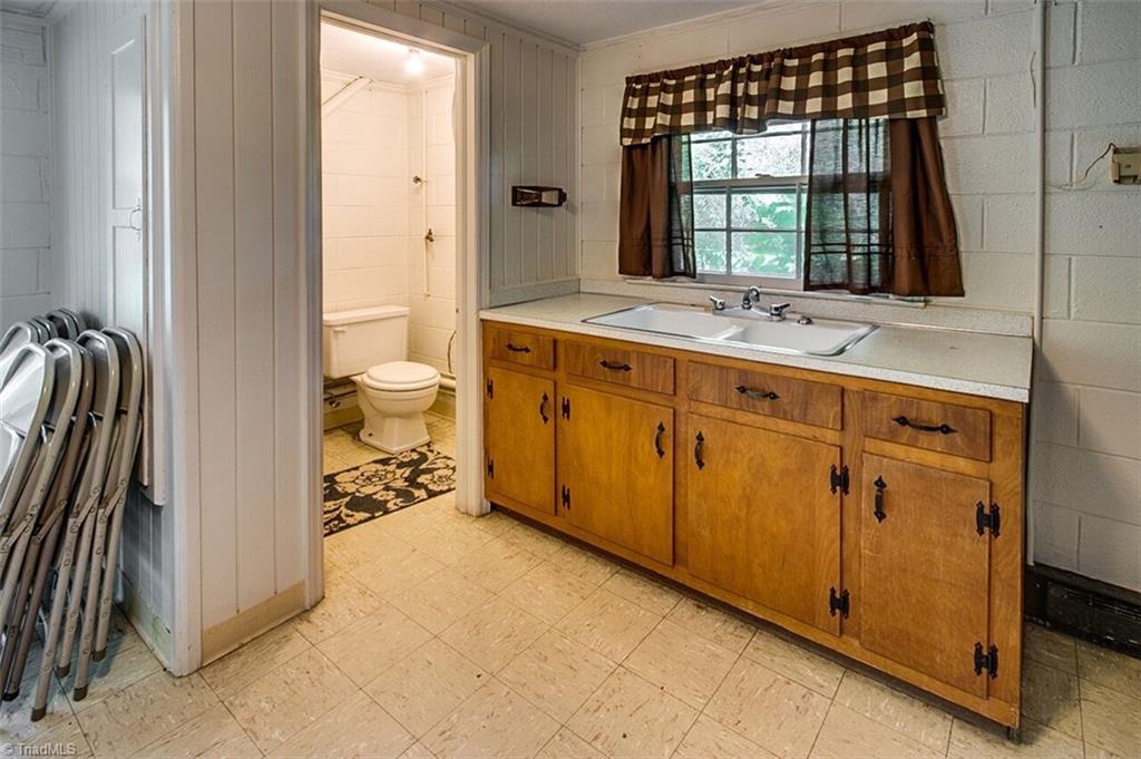 500 Springwood Road Asheboro, NC 27205 - Photo 24 of 25 Basement half bath and sink area