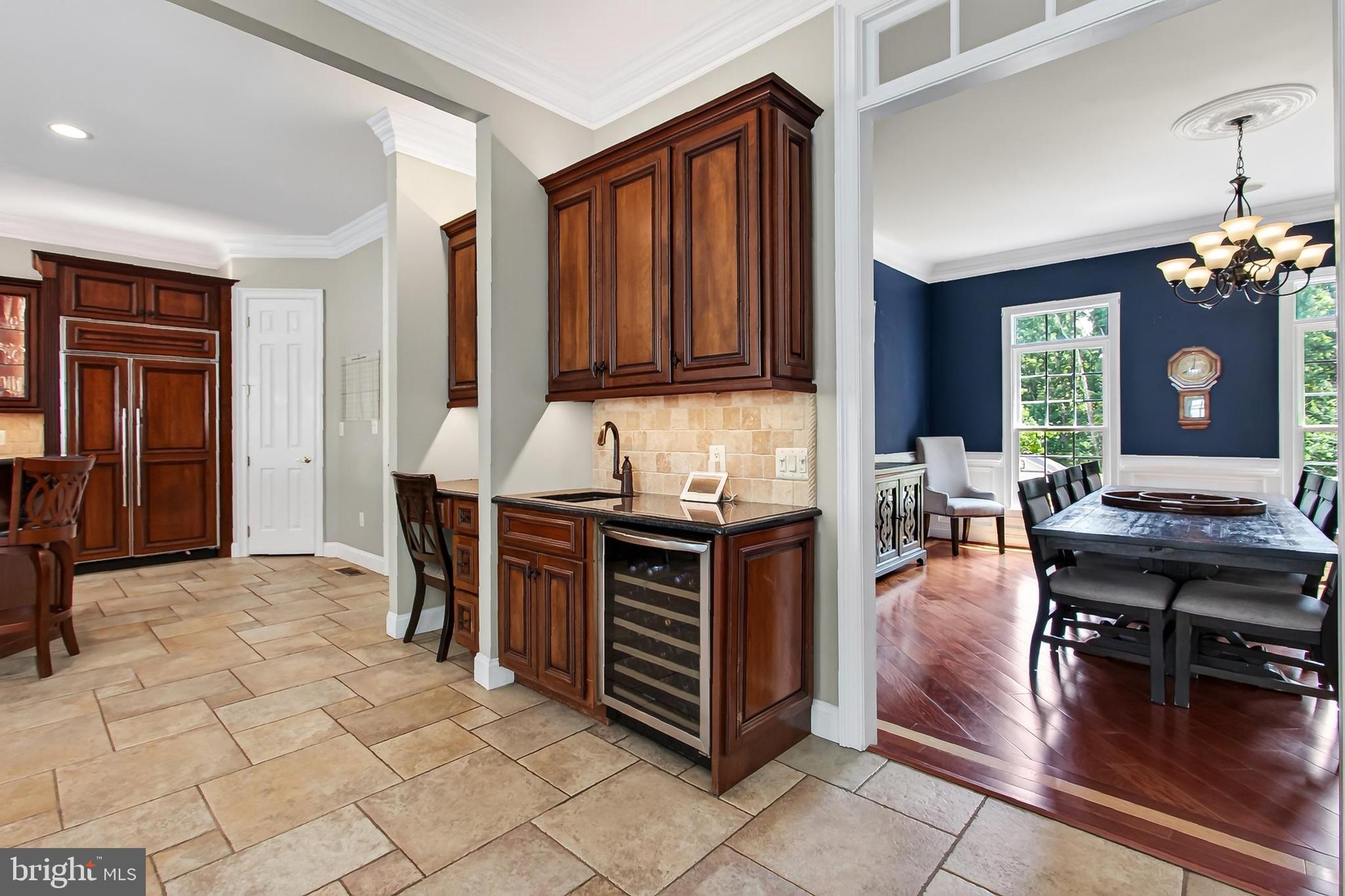 8836 Rommel Drive Lorton, VA 22079 - Photo 34 of 133 Built-in work area with wine cooler