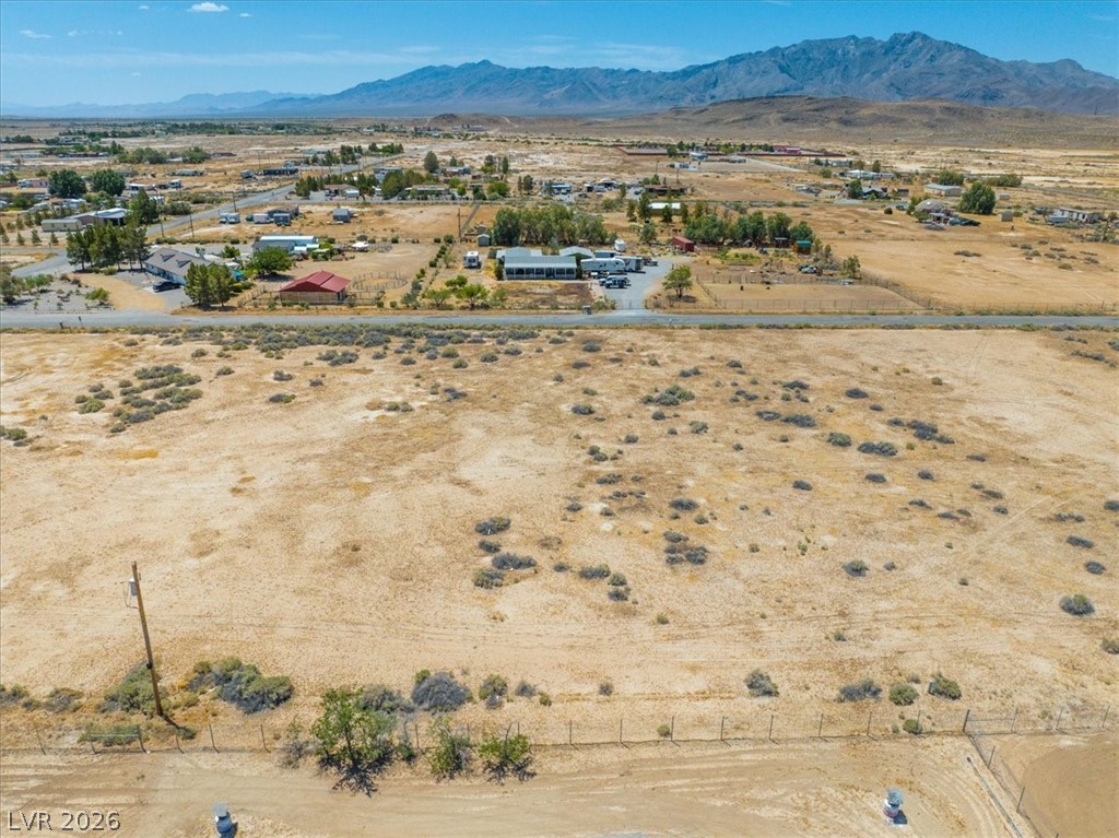 4580 Lawrence Road Pahrump, NV 89048 - Photo 25 of 40 A vast, open lot offers panoramic desert and mountain vistas, perfect for creating your vision.