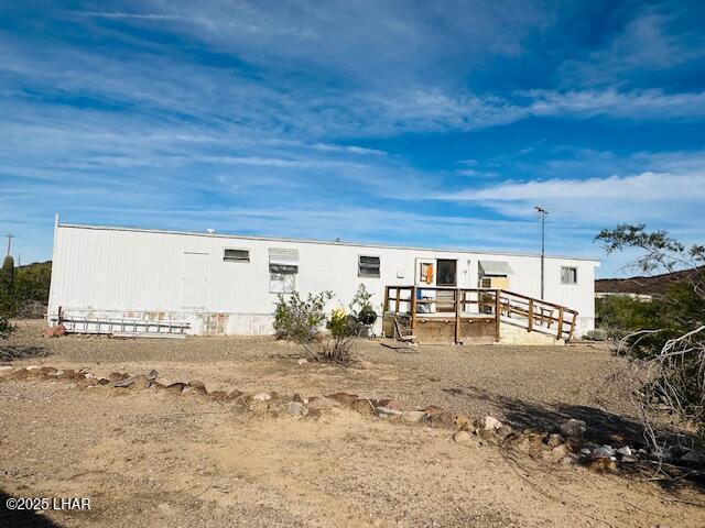 46052 East Perry Lane Salome, AZ 85348 - Photo 6 of 10 a view of a dirt road and a building