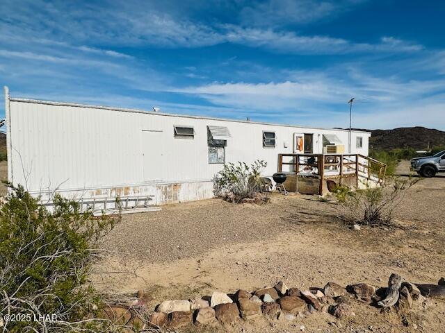 46052 East Perry Lane Salome, AZ 85348 - Photo 7 of 10 a view of a yard with car parked