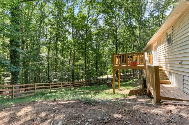 a view of backyard with green space
