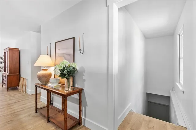 a workspace with furniture and a potted plant