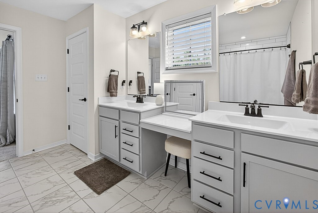18517 Palisades Ridge Moseley, VA 23120 - Photo 25 of 55 a bathroom with a sink double vanity and a mirror