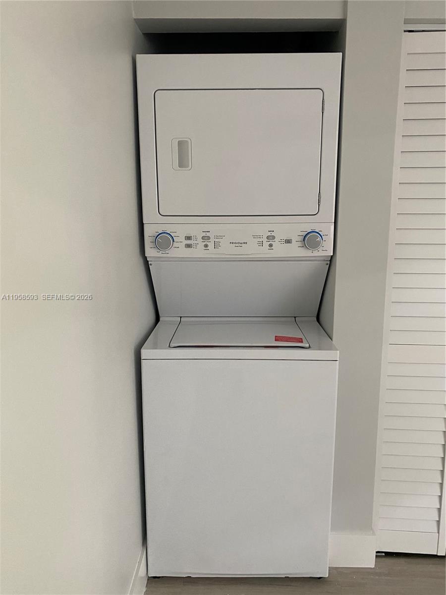 7175 Northwest 179th Street, Unit 302 Hialeah, FL 33015 - Photo 11 of 49 a close up view of washer and dryer