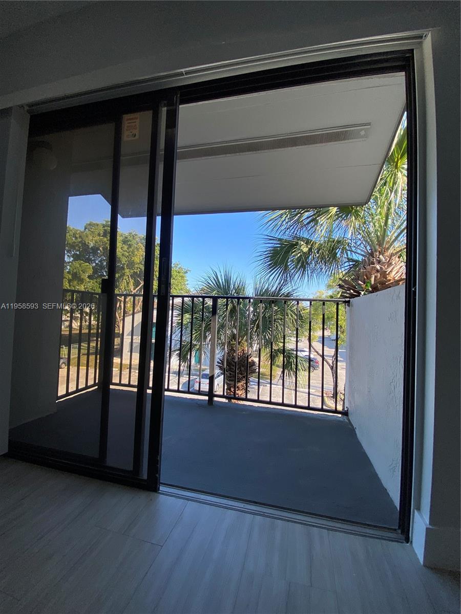 7175 Northwest 179th Street, Unit 302 Hialeah, FL 33015 - Photo 34 of 49 a view of an outdoor from a window