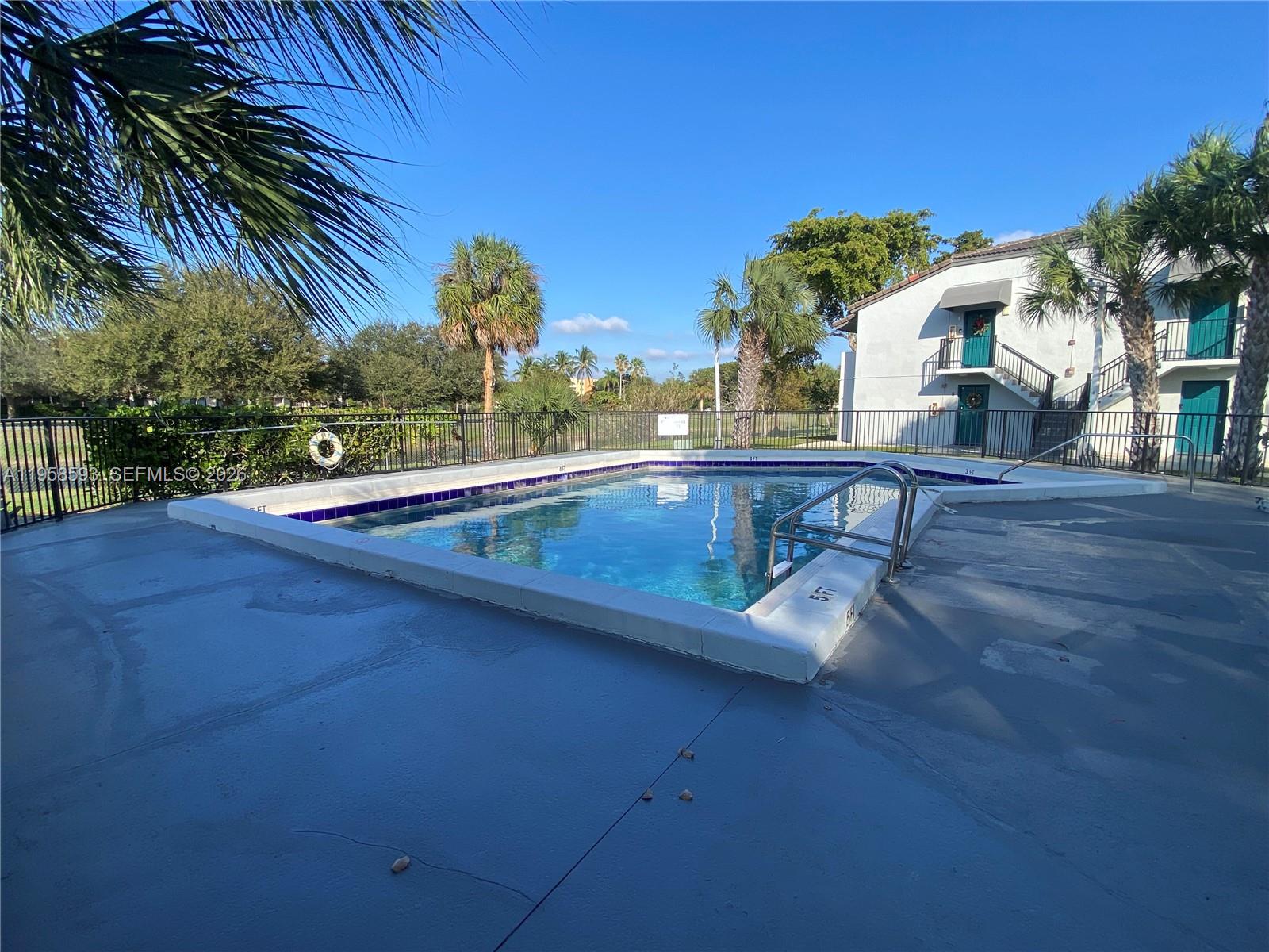 7175 Northwest 179th Street, Unit 302 Hialeah, FL 33015 - Photo 46 of 49 a view of outdoor space and yard