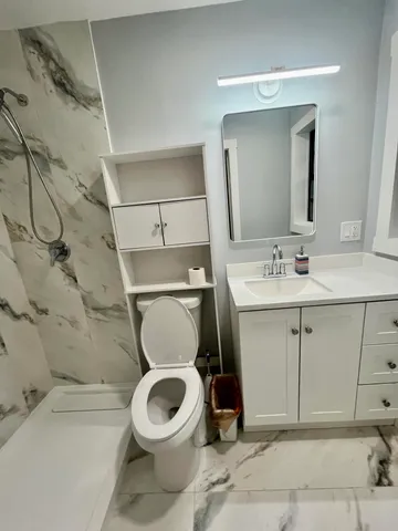 a view of a garage with storage