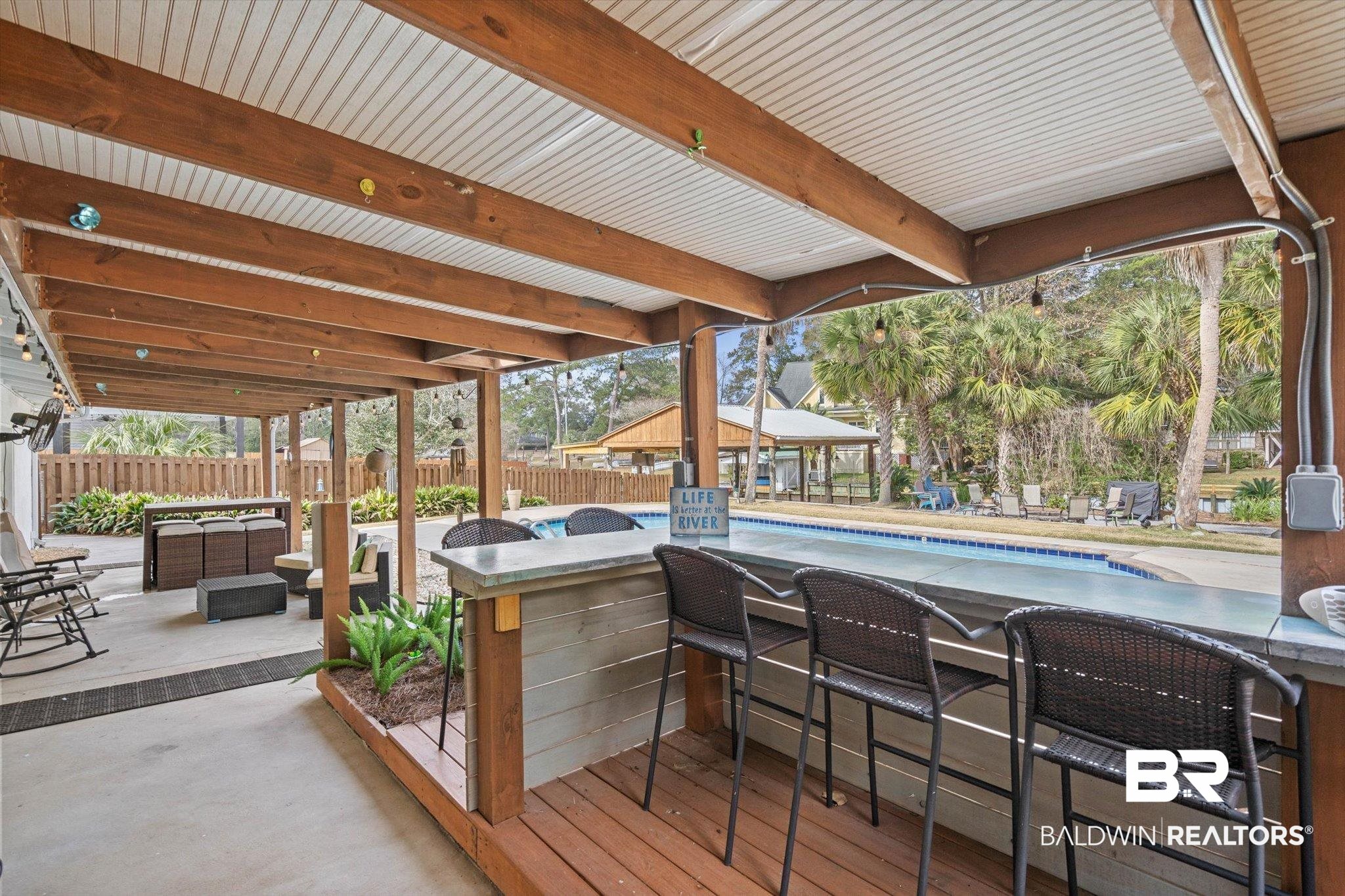 3720 Rabbit Creek Court Theodore, AL 36582 - Photo 19 of 47 Wooden deck featuring a patio, an outdoor pool, and an outdoor hangout area