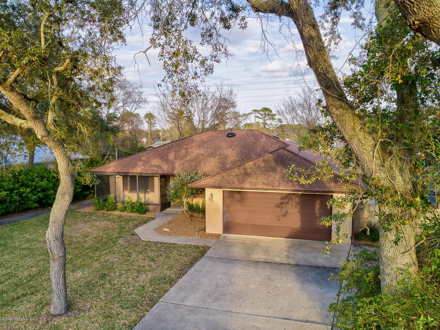215 Cornell Road St. Augustine, FL 32086 - Photo 1 of 28 front view of a house with a yard