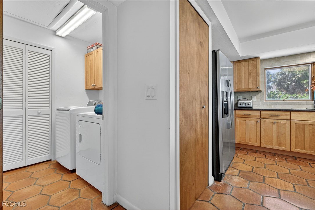 5307 Ladyfinger Lake Road Sanibel, FL 33957 - Photo 25 of 45 a view of a hallway with wooden floor and cabinet