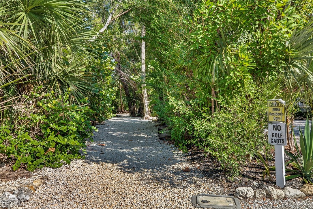 5307 Ladyfinger Lake Road Sanibel, FL 33957 - Photo 3 of 45 a pathway of a yard