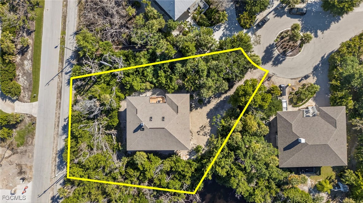 5307 Ladyfinger Lake Road Sanibel, FL 33957 - Photo 4 of 45 an aerial view of a house