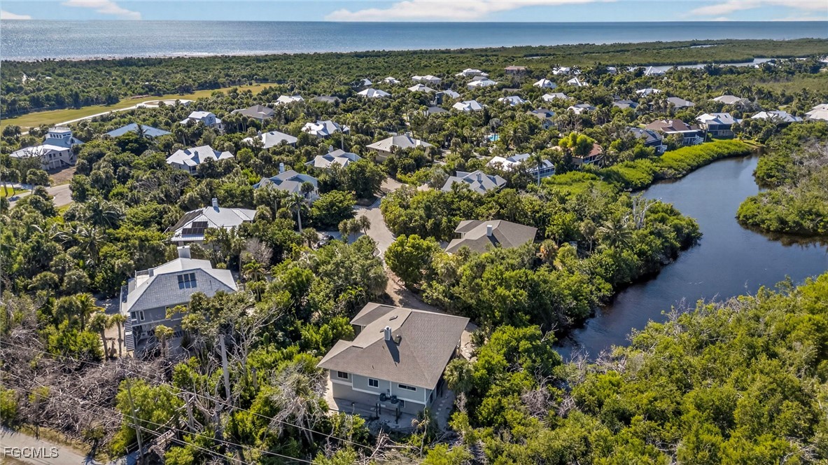 5307 Ladyfinger Lake Road Sanibel, FL 33957 - Photo 42 of 45 an aerial view of a house with a yard