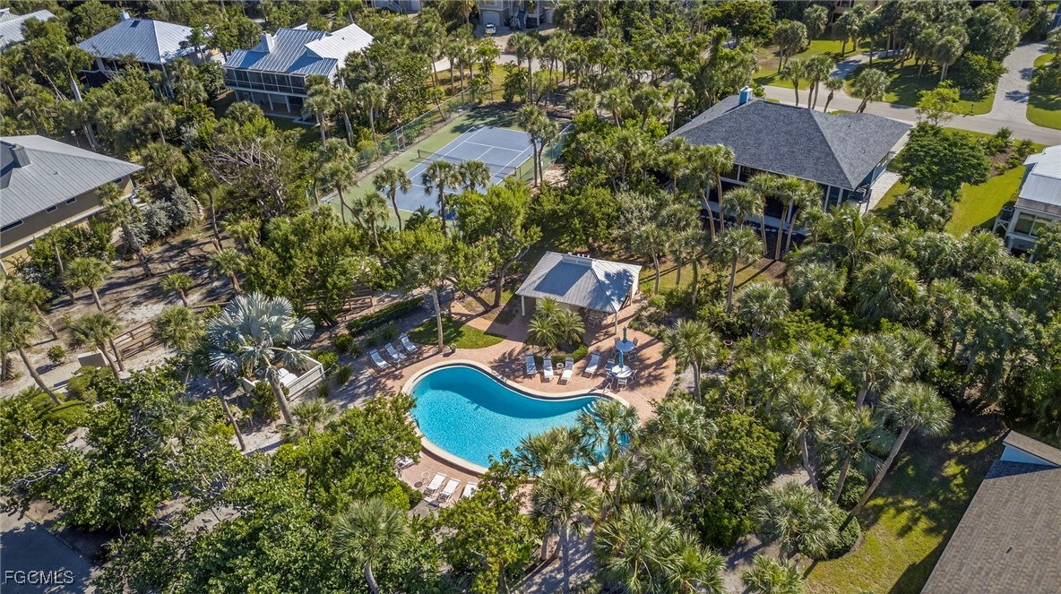 5307 Ladyfinger Lake Road Sanibel, FL 33957 - Photo 8 of 45 an aerial view of a house with yard swimming pool and outdoor seating