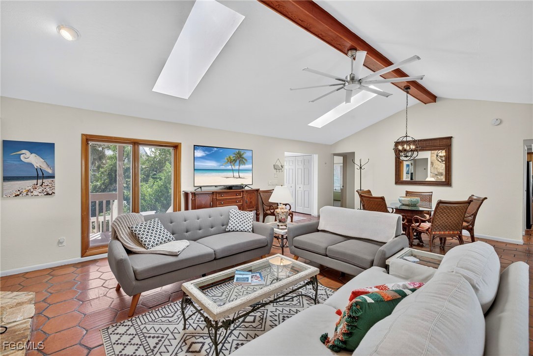 5307 Ladyfinger Lake Road Sanibel, FL 33957 - Photo 9 of 45 a living room with furniture and a window