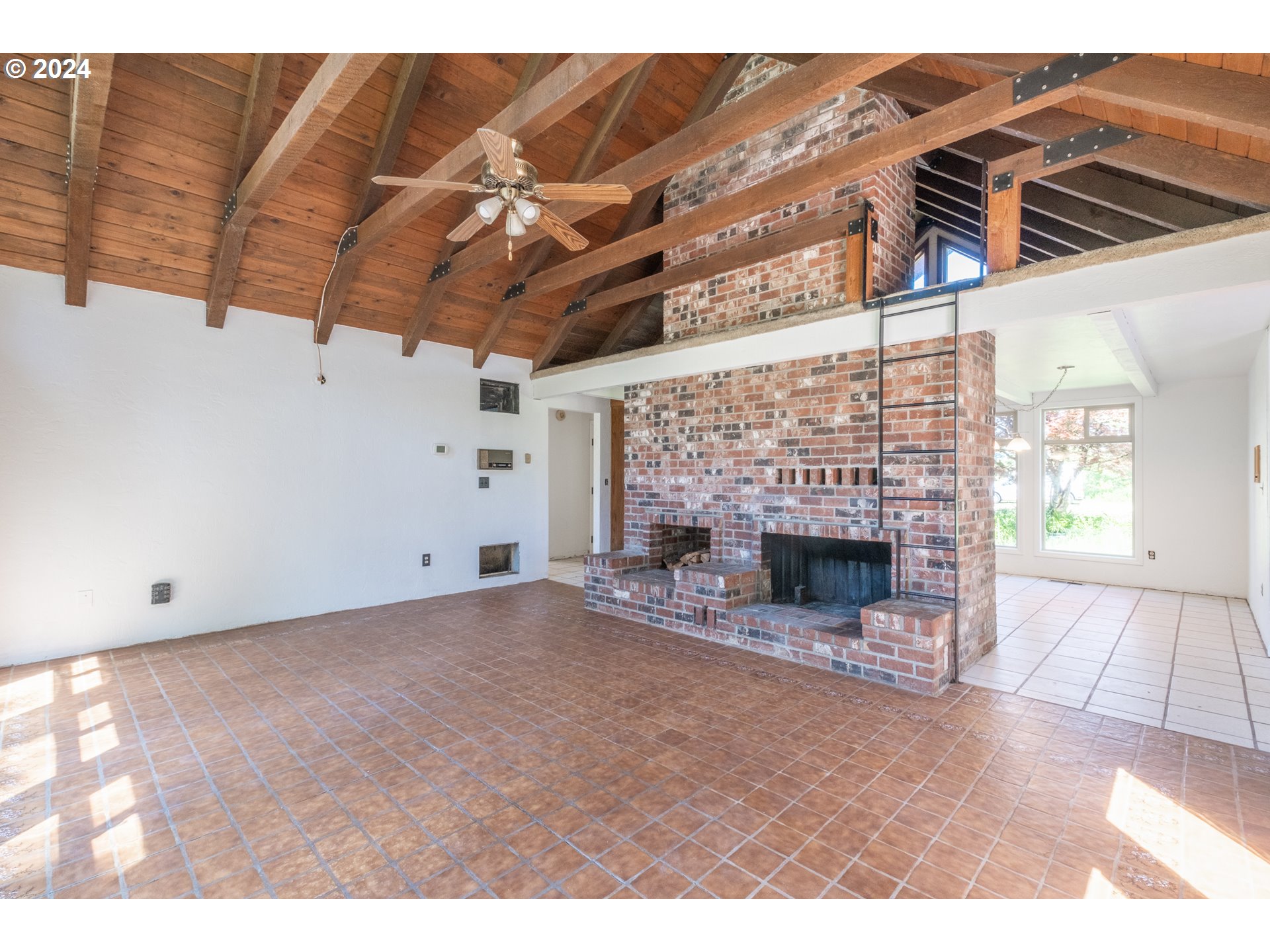 33964 Ford Mill Road Lebanon, OR 97355 - Photo 9 of 42 a view of empty room with a fireplace