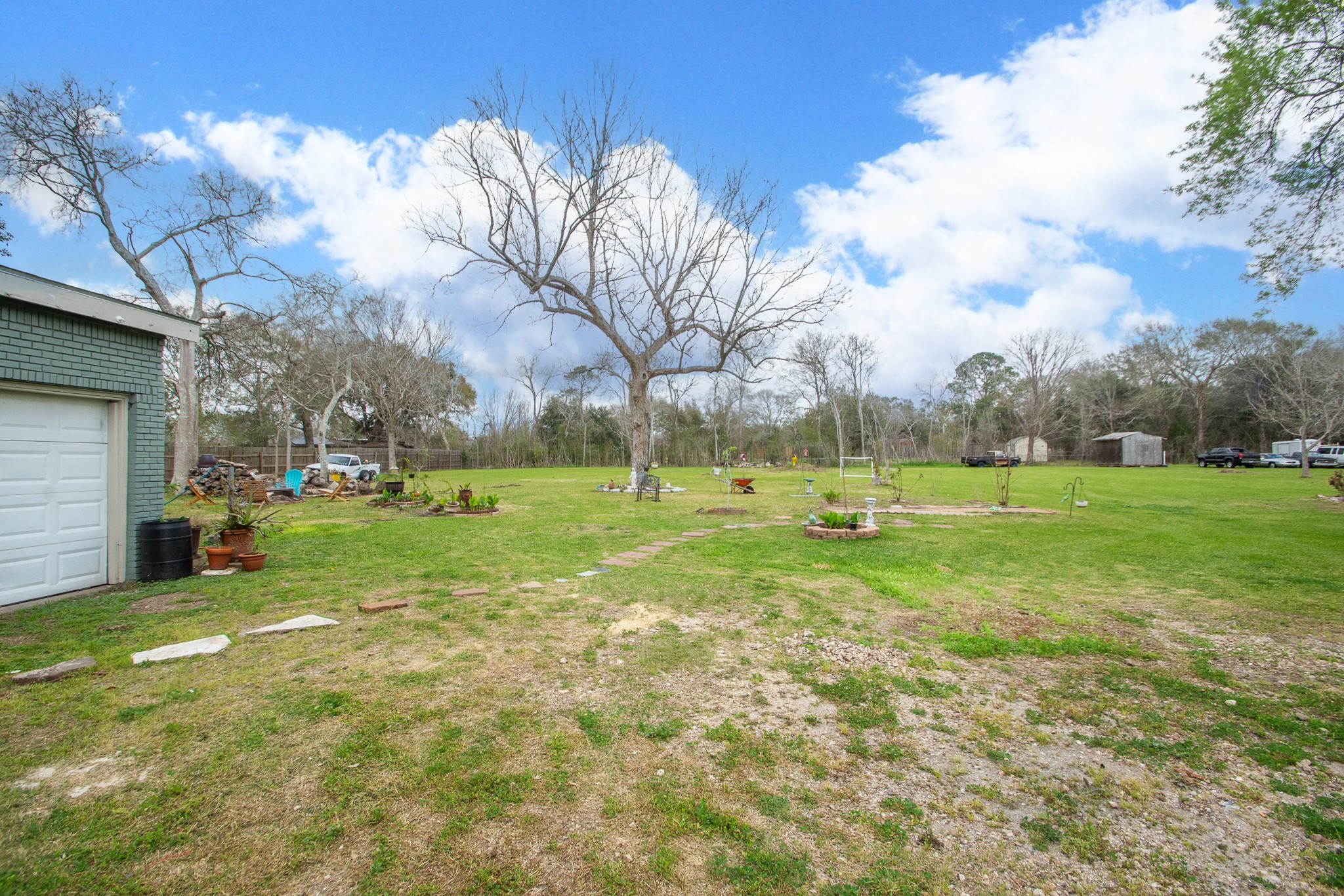 2930 West Shane Street Alvin, TX 77511 - Photo 4 of 19 a view of a park with large trees