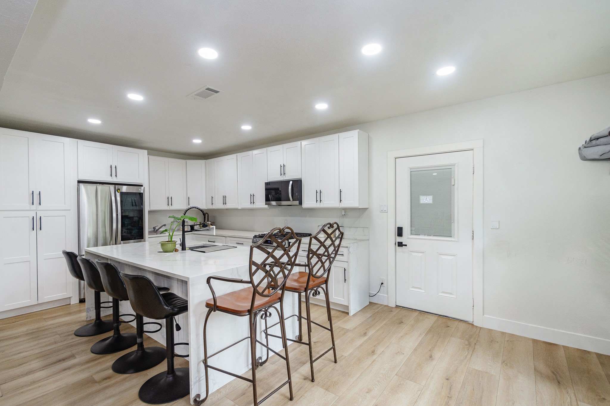 2930 West Shane Street Alvin, TX 77511 - Photo 5 of 19 a view of a dining room with furniture