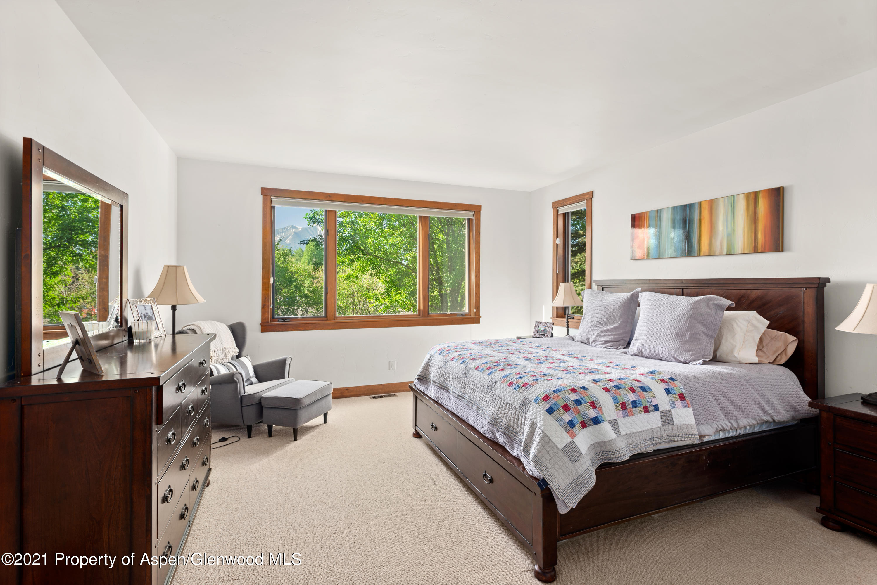 408 Settlement Lane Carbondale, CO 81623 - Photo 4 of 11 a bedroom with a large bed and a large window