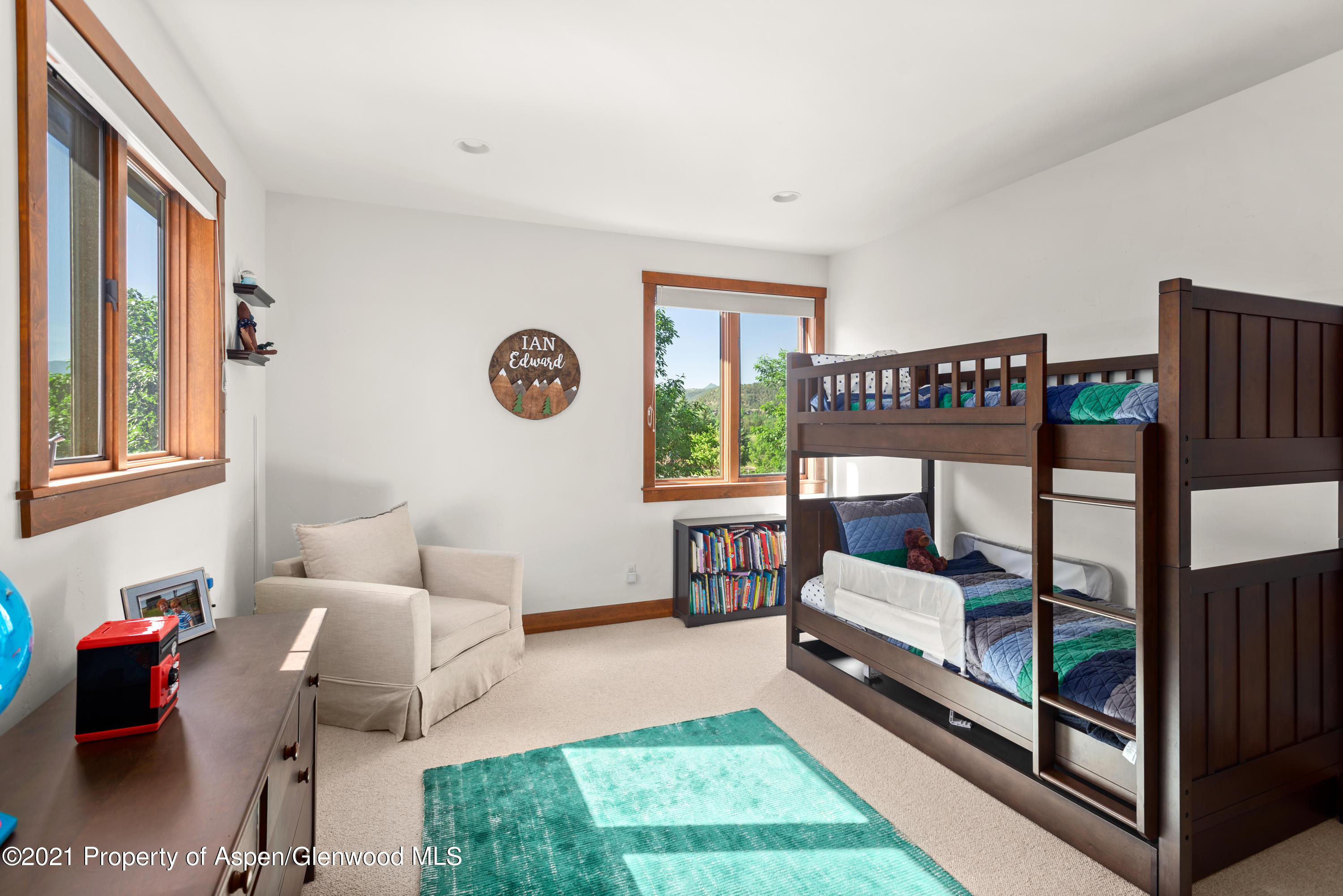 408 Settlement Lane Carbondale, CO 81623 - Photo 8 of 11 a bedroom with furniture and a window