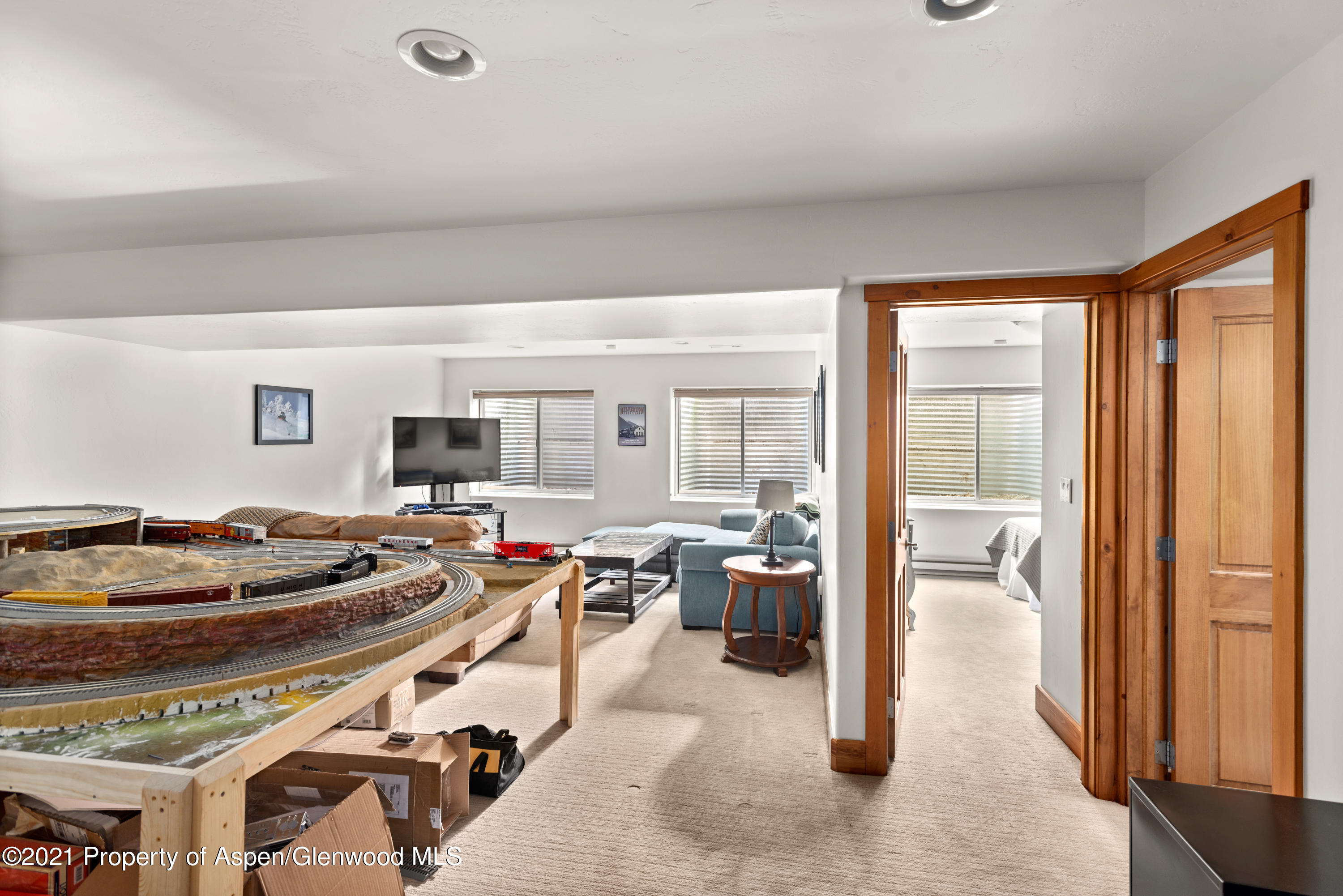 408 Settlement Lane Carbondale, CO 81623 - Photo 9 of 11 a living room with furniture and a table