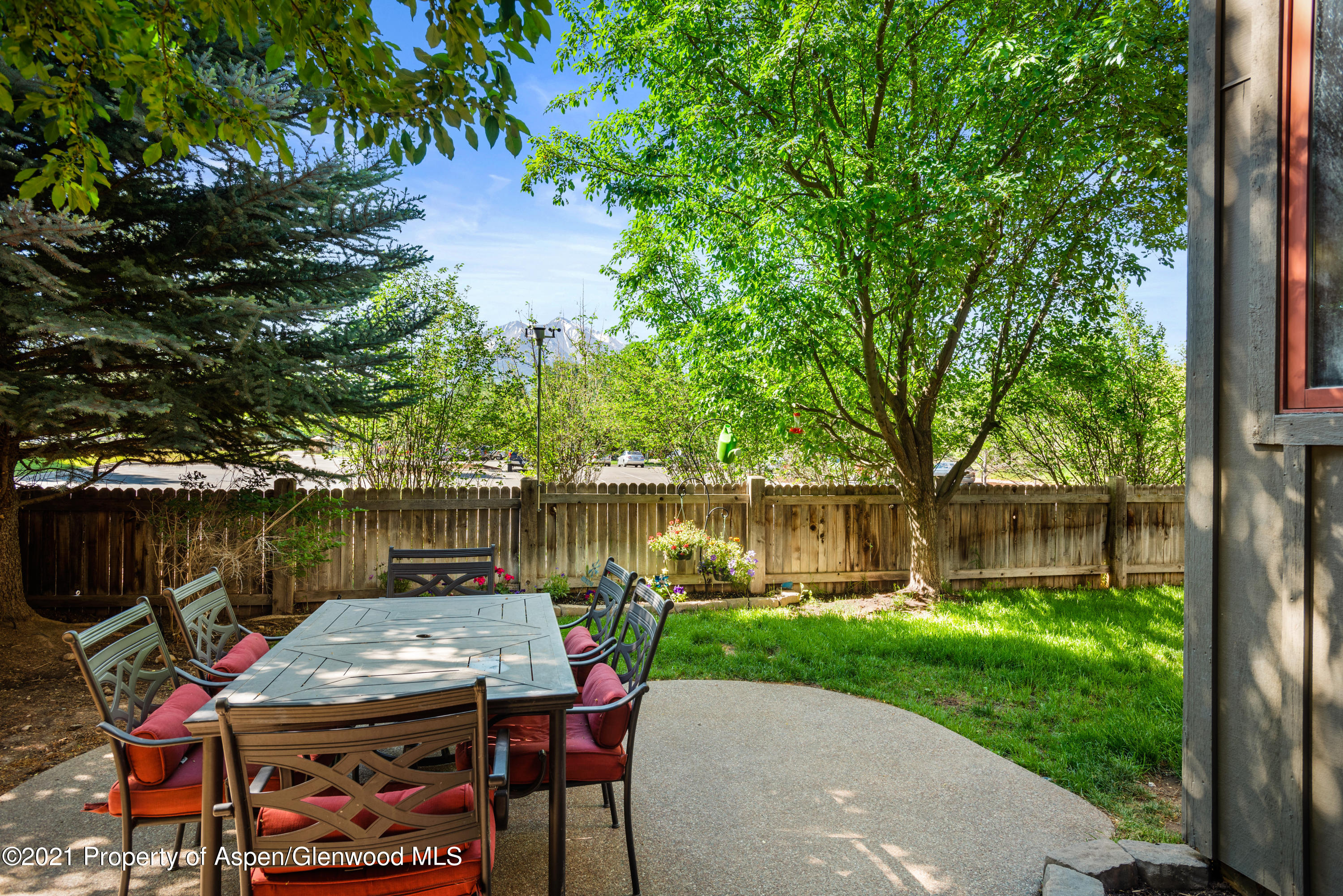 408 Settlement Lane Carbondale, CO 81623 - Photo 10 of 11 a view of house with outdoor seating and lake