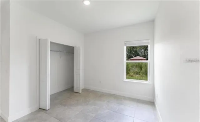 a view of an empty room and window