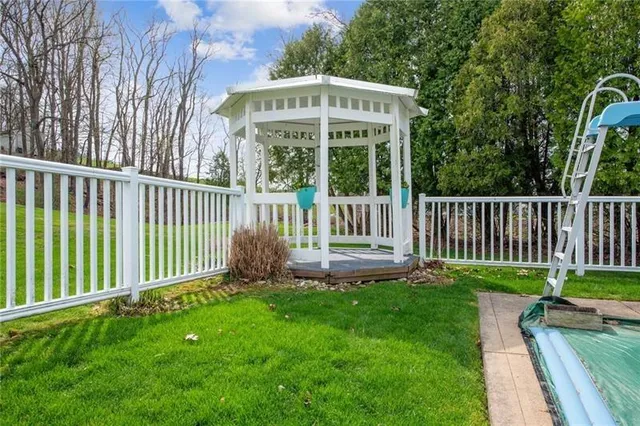 a view of a deck with a fence